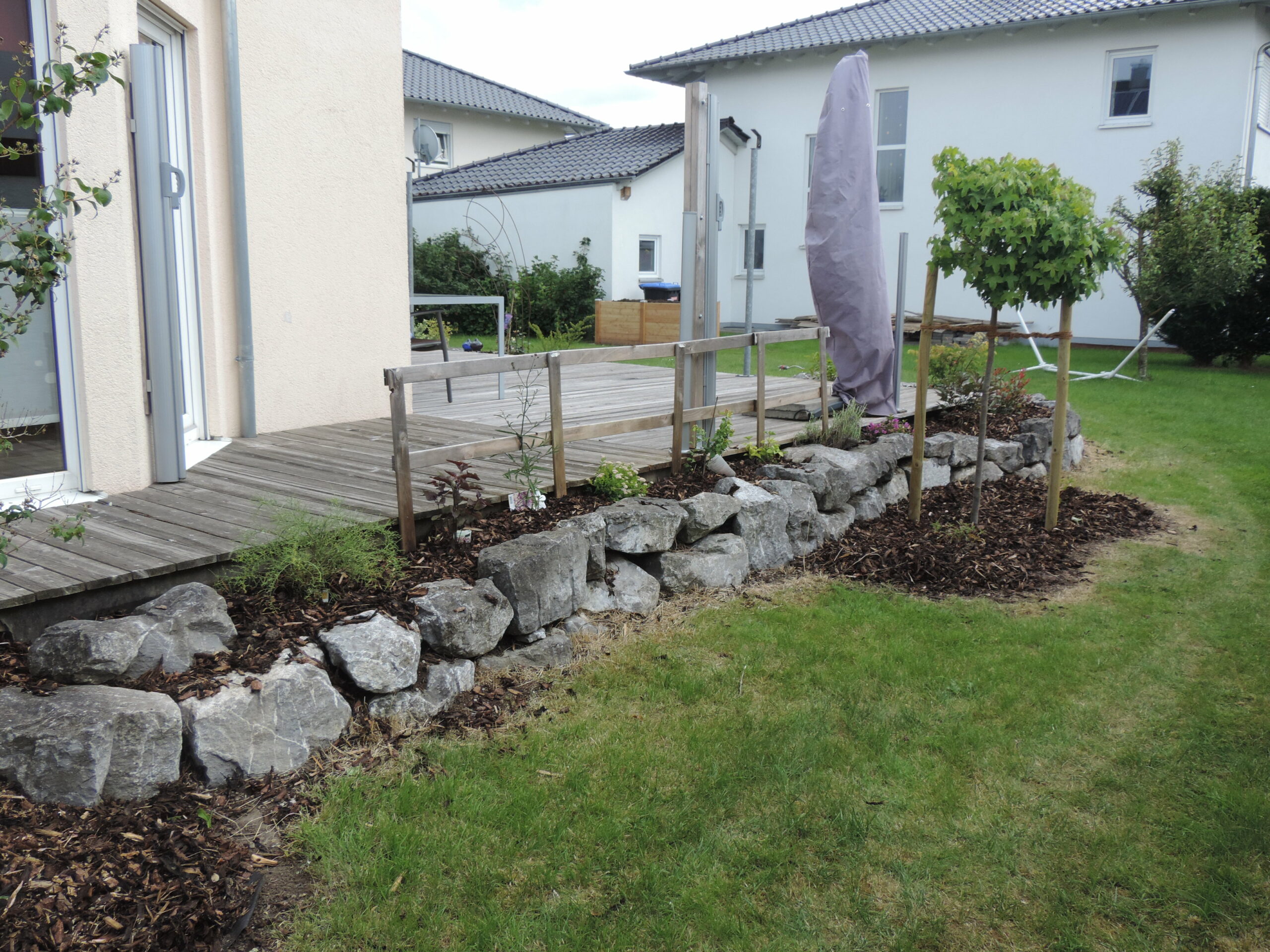 Terassenbau Baumfllarbeiten